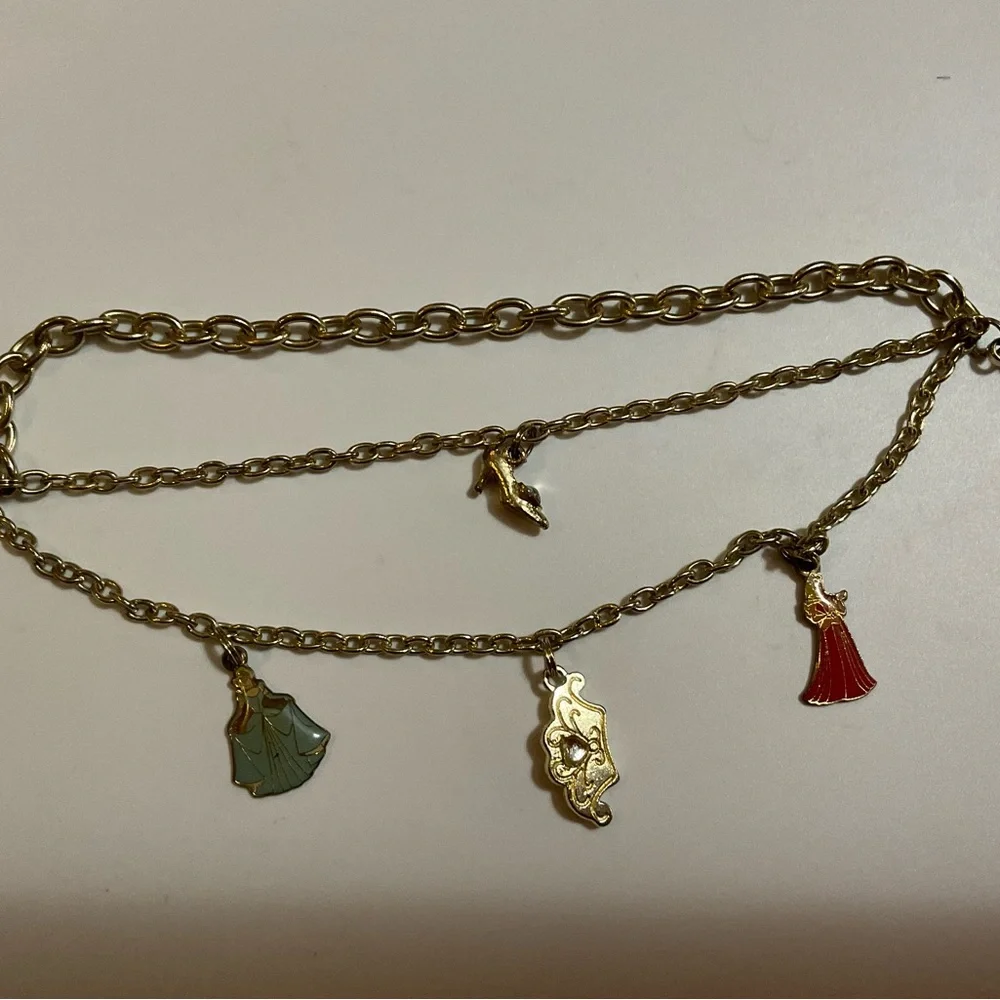 Kids charms bracelet Cinderella and Aurora, shoe and crown 8 1/2 inch bracelet